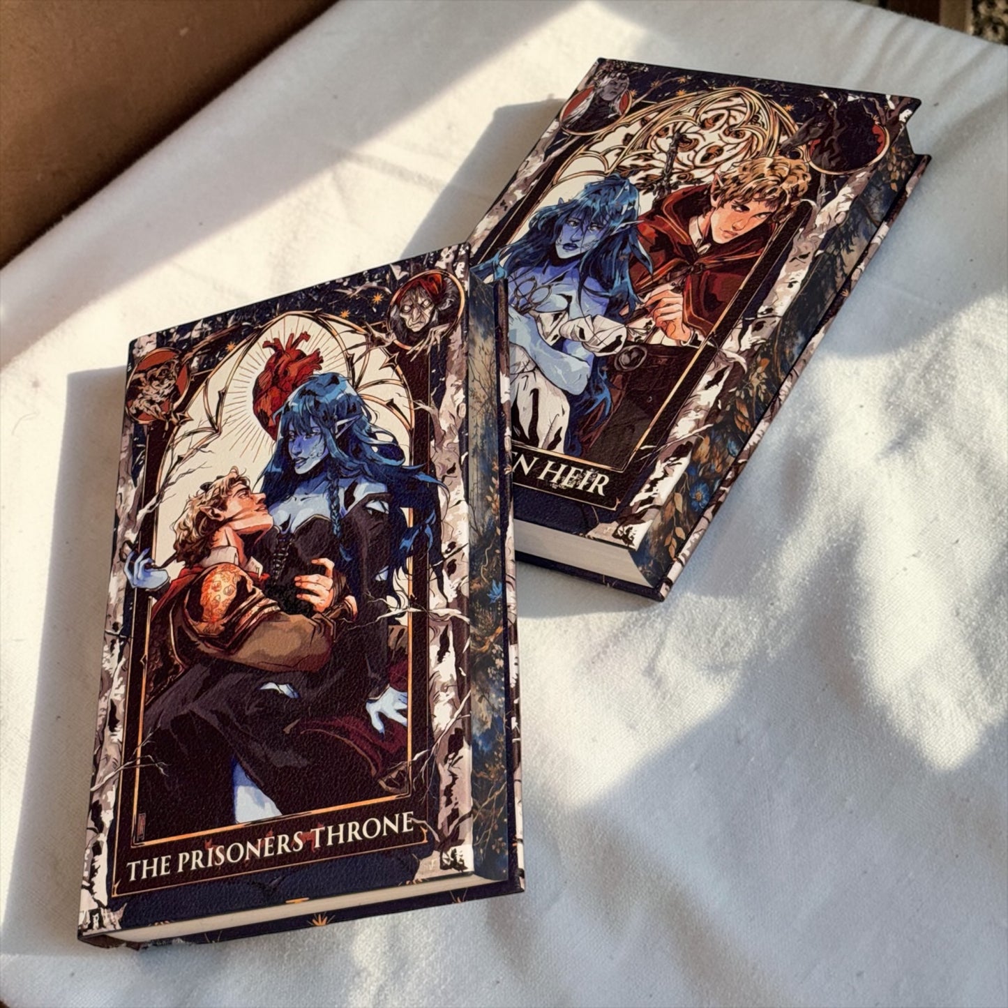 PREORDER - The Stolen Heir Duology Luxury Rebinds X Marine VHS Hand-bound Faux Leather Hardback | Sprayed Edges | Custom End Papers