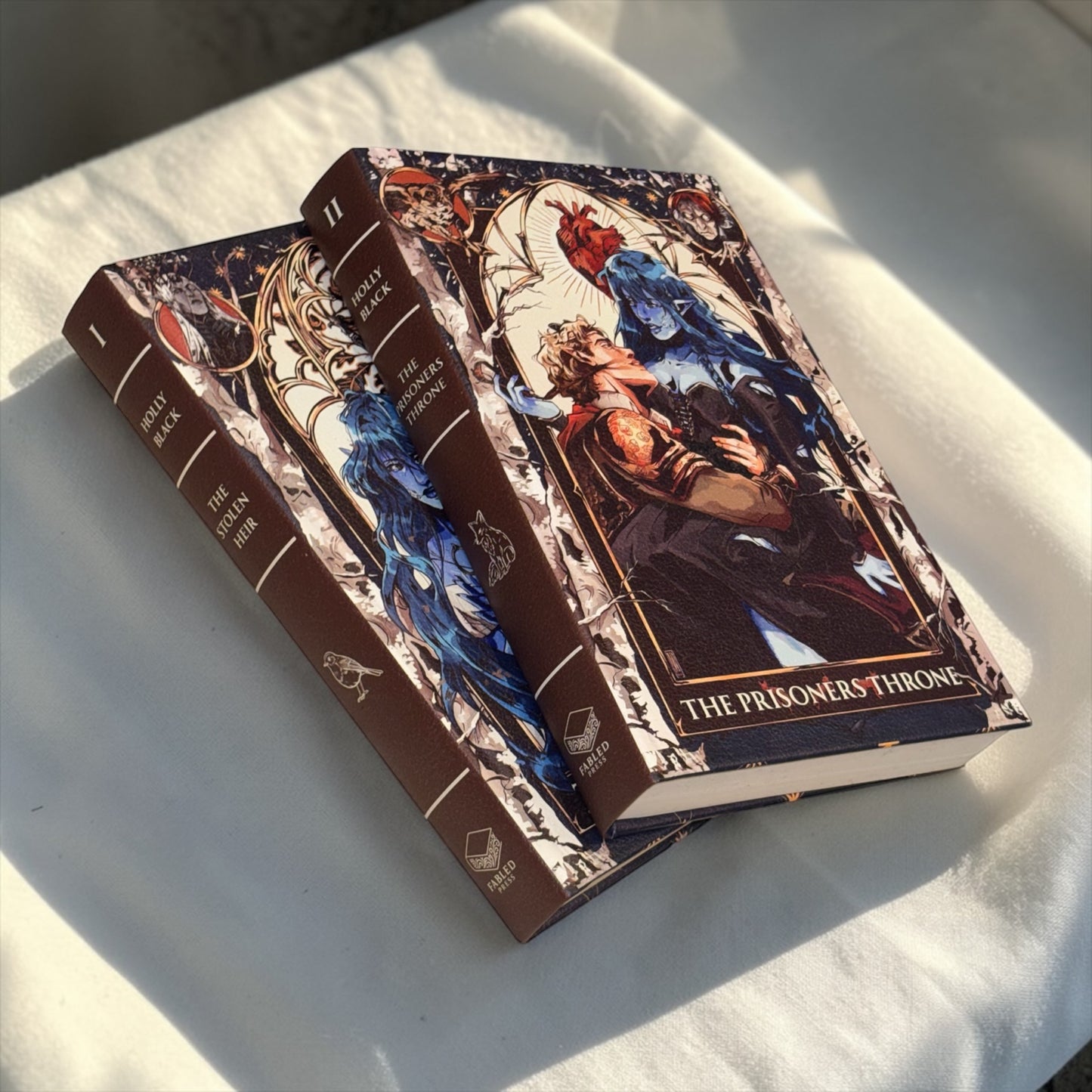 PREORDER - The Stolen Heir Duology Luxury Rebinds X Marine VHS Hand-bound Faux Leather Hardback | Sprayed Edges | Custom End Papers